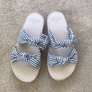 Never worn Hollister sandals.